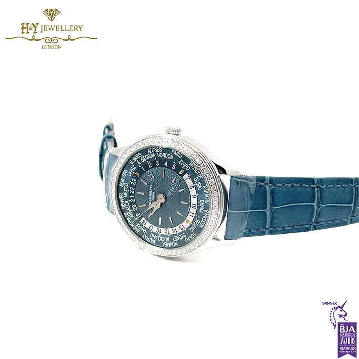 Patek Philippe World Time White Gold Diamond Bezel - ref 7130G-016-17645